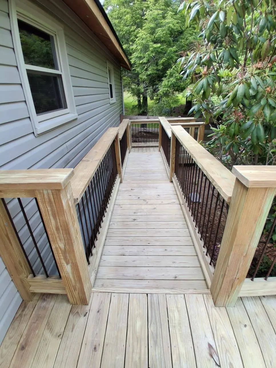 New unstained deck railing before staining near Asheville NC