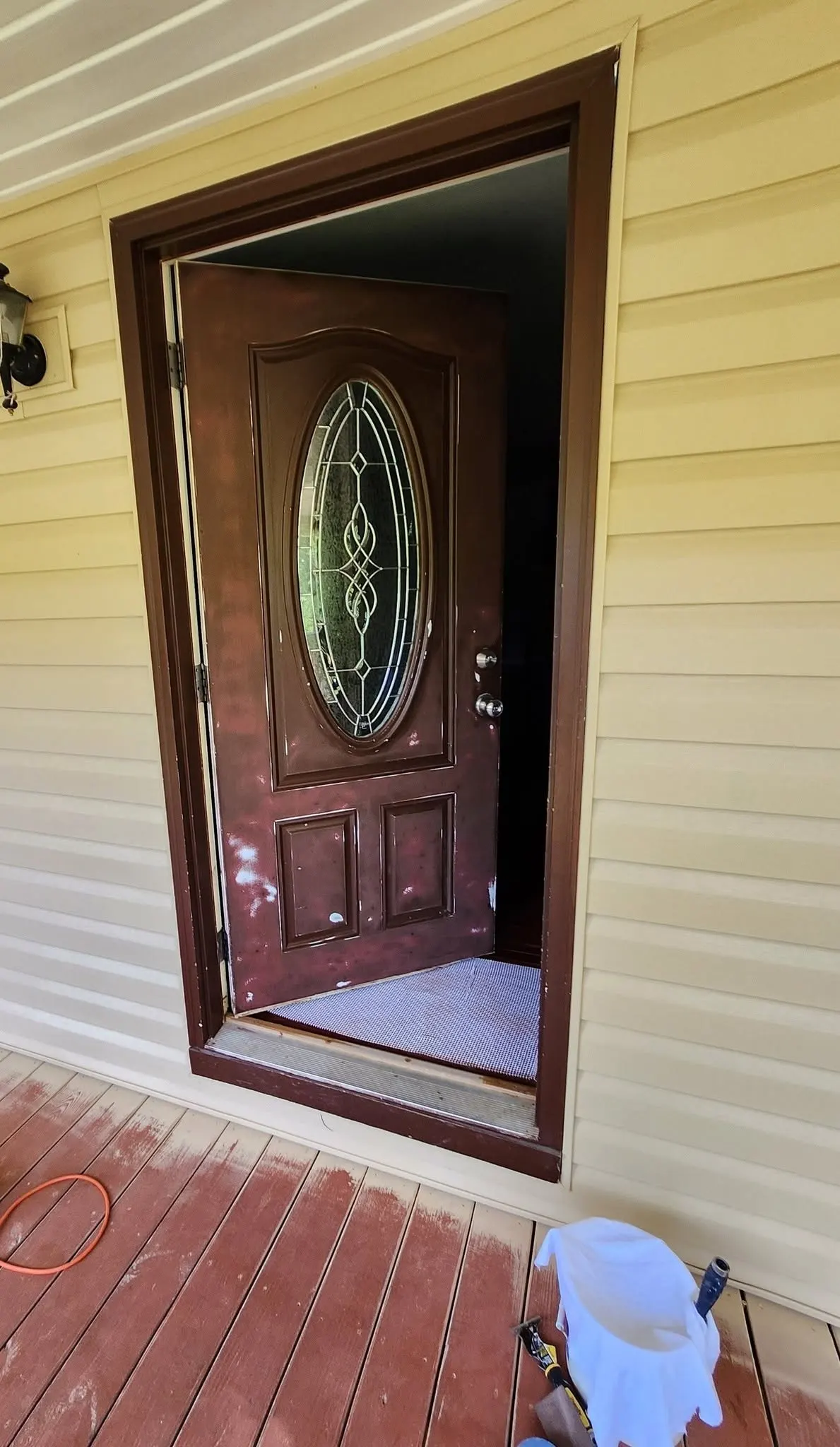 Close-up of a freshly painted exterior door during a repaint project
